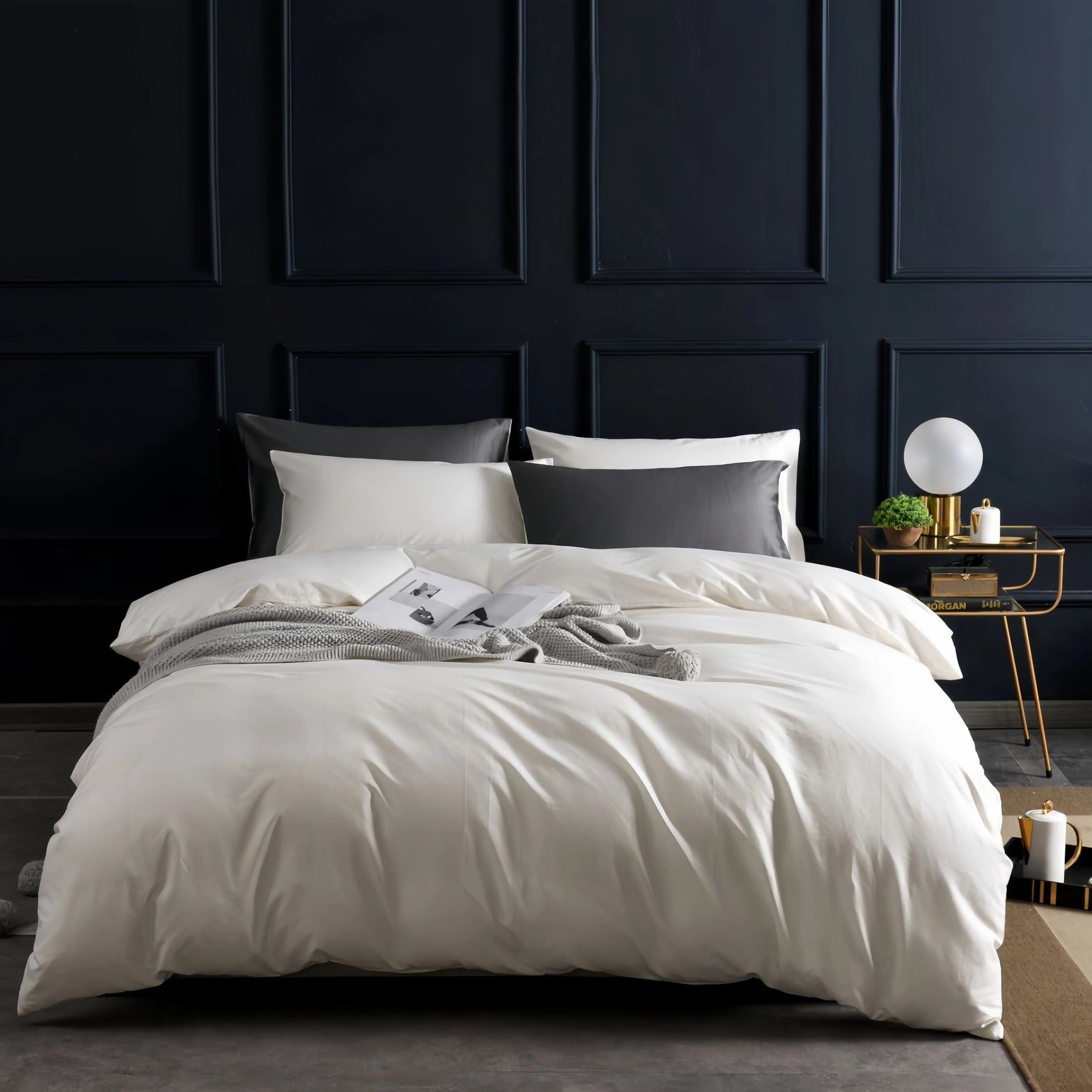 Cream cotton sateen doona cover set styled on a bed